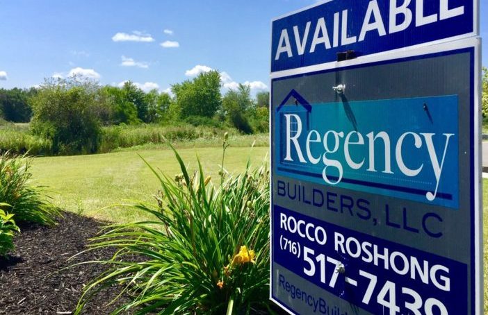 Regency signage in front of house